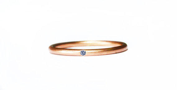 An exquisite blue diamond for a one-of-a-kind wedding band. Langerman Diamonds. 