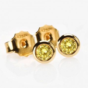 Yellow gold bezel-set stud earrings set with natural intense yellow diamonds. Langerman Diamonds